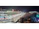 Aerial view of a crowded raceway at night at 205 E Harmon Ave # 704, Las Vegas, NV 89169