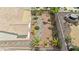 Aerial view of the home with desert landscaping and rock feature at 2119 Lewiston Pl, Henderson, NV 89044