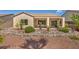 Desert landscaped backyard with covered patio at 2119 Lewiston Pl, Henderson, NV 89044