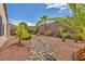 Backyard with desert landscaping and block wall at 2119 Lewiston Pl, Henderson, NV 89044