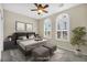 Comfortable bedroom with neutral colors and a ceiling fan at 2119 Lewiston Pl, Henderson, NV 89044