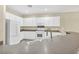 Bright kitchen with white cabinetry, modern appliances, and ample counter space at 2119 Lewiston Pl, Henderson, NV 89044