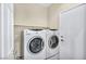 Laundry room with stacked washer and dryer at 2119 Lewiston Pl, Henderson, NV 89044