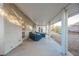 A covered patio with ample space for outdoor seating and entertainment at 2823 Landau Ct, Henderson, NV 89074