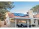 Home featuring solar panels, a covered patio, and a tile roof, enhancing its appeal at 2823 Landau Ct, Henderson, NV 89074