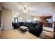 Open-concept living room showcases tile floors, high ceilings, and a fireplace at 2823 Landau Ct, Henderson, NV 89074