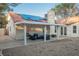 Inviting covered patio with modern outdoor seating, perfect for entertaining and relaxing at 2823 Landau Ct, Henderson, NV 89074