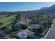 An aerial view of a Primary planned community with tree lined streets at 3004 Darby Falls Dr, Las Vegas, NV 89134