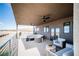 This covered patio offers mountain views, ceiling fans, and plenty of comfortable seating, making it ideal for outdoor living at 3530 S Spring Mountain Blvd Ct, Pahrump, NV 89048