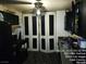 This kitchen features ample storage with dark cabinets and access to appliances at 421 Miller Ave, North Las Vegas, NV 89030
