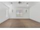 Bedroom with carpet, window with shutters, neutral paint, and a ceiling fan at 4450 Zev Ct, Las Vegas, NV 89121