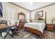 Bedroom with a decorative bed, furniture, and a window at 4450 Zev Ct, Las Vegas, NV 89121