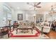 Living area featuring luxurious furniture, large windows, and stylish decor at 4450 Zev Ct, Las Vegas, NV 89121