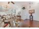 Well-lit living area with staircase, hardwood floors, and classic decor at 4450 Zev Ct, Las Vegas, NV 89121
