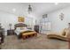 Comfortable main bedroom with neutral colors and ornate furnishings at 4450 Zev Ct, Las Vegas, NV 89121
