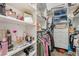Organized walk-in closet featuring shelves, drawers, and hanging storage at 4450 Zev Ct, Las Vegas, NV 89121