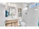 Modern bathroom featuring a walk-in shower, stylish vanity, and decorative wall art at 4571 Mcmillan Rd, Las Vegas, NV 89121