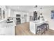 Contemporary kitchen with stainless steel appliances, breakfast bar, and bright, airy feel at 4571 Mcmillan Rd, Las Vegas, NV 89121