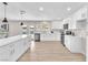 Modern kitchen featuring an island, stainless steel appliances, and backyard views at 4571 Mcmillan Rd, Las Vegas, NV 89121