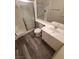 A clean bathroom featuring a glass shower, modern vanity, and wood-look flooring at 5000 Red Rock St # 202, Las Vegas, NV 89118