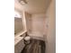 Clean bathroom featuring a tub, shower, modern vanity, and wood-look flooring at 5000 Red Rock St # 202, Las Vegas, NV 89118