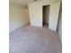 Neutral bedroom featuring a closet and plush carpeting at 5000 Red Rock St # 202, Las Vegas, NV 89118