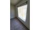 Bright bedroom with a large window, carpet flooring, and light neutral decor at 5000 Red Rock St # 202, Las Vegas, NV 89118