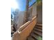 Inviting condo exterior with stairs leading to units, and palm trees at 5000 Red Rock St # 202, Las Vegas, NV 89118