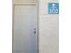 A white door displaying unit number 202, located inside a condo at 5000 Red Rock St # 202, Las Vegas, NV 89118