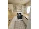 Cozy kitchen with white cabinets and appliances at 5000 Red Rock St # 202, Las Vegas, NV 89118
