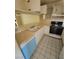 Cozy kitchen with white cabinets and appliances at 5000 Red Rock St # 202, Las Vegas, NV 89118