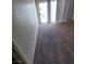 Bright living room featuring plush carpeting and sliding glass door at 5000 Red Rock St # 202, Las Vegas, NV 89118