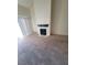 Spacious living room featuring a classic fireplace and large windows at 5000 Red Rock St # 202, Las Vegas, NV 89118