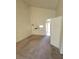 Bright, carpeted living room with vaulted ceiling, featuring bar seating and neutral decor at 5000 Red Rock St # 202, Las Vegas, NV 89118