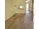 Living room featuring plush carpeting and breakfast bar at 5000 Red Rock St # 202, Las Vegas, NV 89118