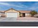 Charming single-story home featuring a two-car garage and desert landscaping for low maintenance at 5314 Sable Ct, North Las Vegas, NV 89031