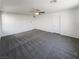 Bedroom with neutral carpet and fan lighting at 5721 Coral Sun St, North Las Vegas, NV 89031