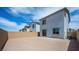 A spacious backyard is enclosed with a brick wall and features minimal landscaping at 637 N Water St, Henderson, NV 89015