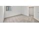 Cozy bedroom with soft carpeting, closet, and ample natural light at 637 N Water St, Henderson, NV 89015