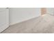Close-up of a bedroom showing plush neutral carpeting and freshly painted walls at 637 N Water St, Henderson, NV 89015