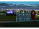 Outdoor community event featuring a movie screen, residents, and event space with Las Vegas skyline at 637 N Water St, Henderson, NV 89015
