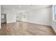 Bright living room featuring wood-look flooring and recessed lighting at 637 N Water St, Henderson, NV 89015