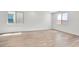 Spacious and bright living space with hardwood floors and large windows at 637 N Water St, Henderson, NV 89015