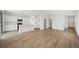 Bright and open living space features modern hardwood floors and flows into the kitchen at 637 N Water St, Henderson, NV 89015