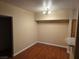 Bright dining room with hardwood floors and modern lighting, adjacent to kitchen at 7255 W Sunset Rd # 1171, Las Vegas, NV 89113