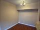 Bright dining room with hardwood floors and modern lighting, adjacent to kitchen at 7255 W Sunset Rd # 1171, Las Vegas, NV 89113
