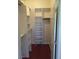 Bright walk-in closet featuring custom shelving and hardwood flooring, perfect for organization and storage at 7255 W Sunset Rd # 1171, Las Vegas, NV 89113
