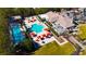 Aerial view of the community pool area featuring a large pool, seating, and well-manicured landscaping at 800 Jody Brook Ct, Las Vegas, NV 89145