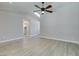 Spacious living room with skylight and ceiling fan offers ample natural light and comfortable airflow at 9031 W Cherokee Ave, Las Vegas, NV 89147