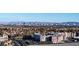 Stunning aerial view of the community with the city skyline and mountain backdrop at 9101 Alta Dr # 1206, Las Vegas, NV 89145